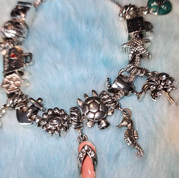 Silver tone charm bracelet, travel beach theme 7 to 8 in - Picture 2 of 9